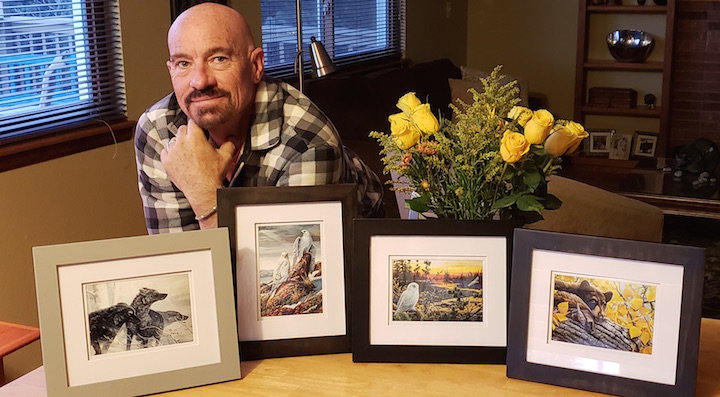 Ray Shaw with 5x7 framed prints