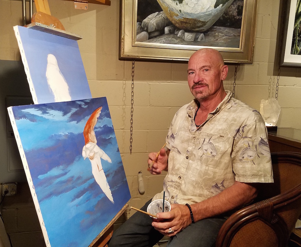 Ray painting at
                    his gallery